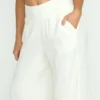 Pantalones de gasa con cintura elástica New Waves Pantalones de gasa con cintura elástica New Waves